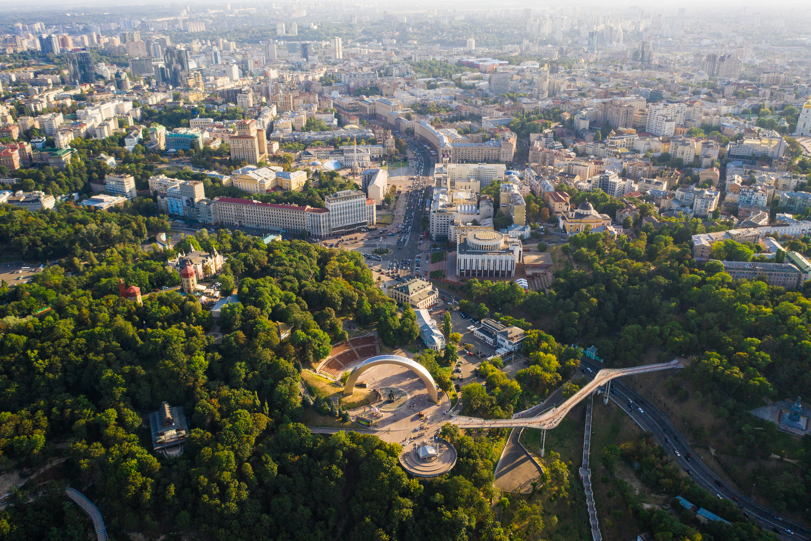 About background showing aerial view of the city.